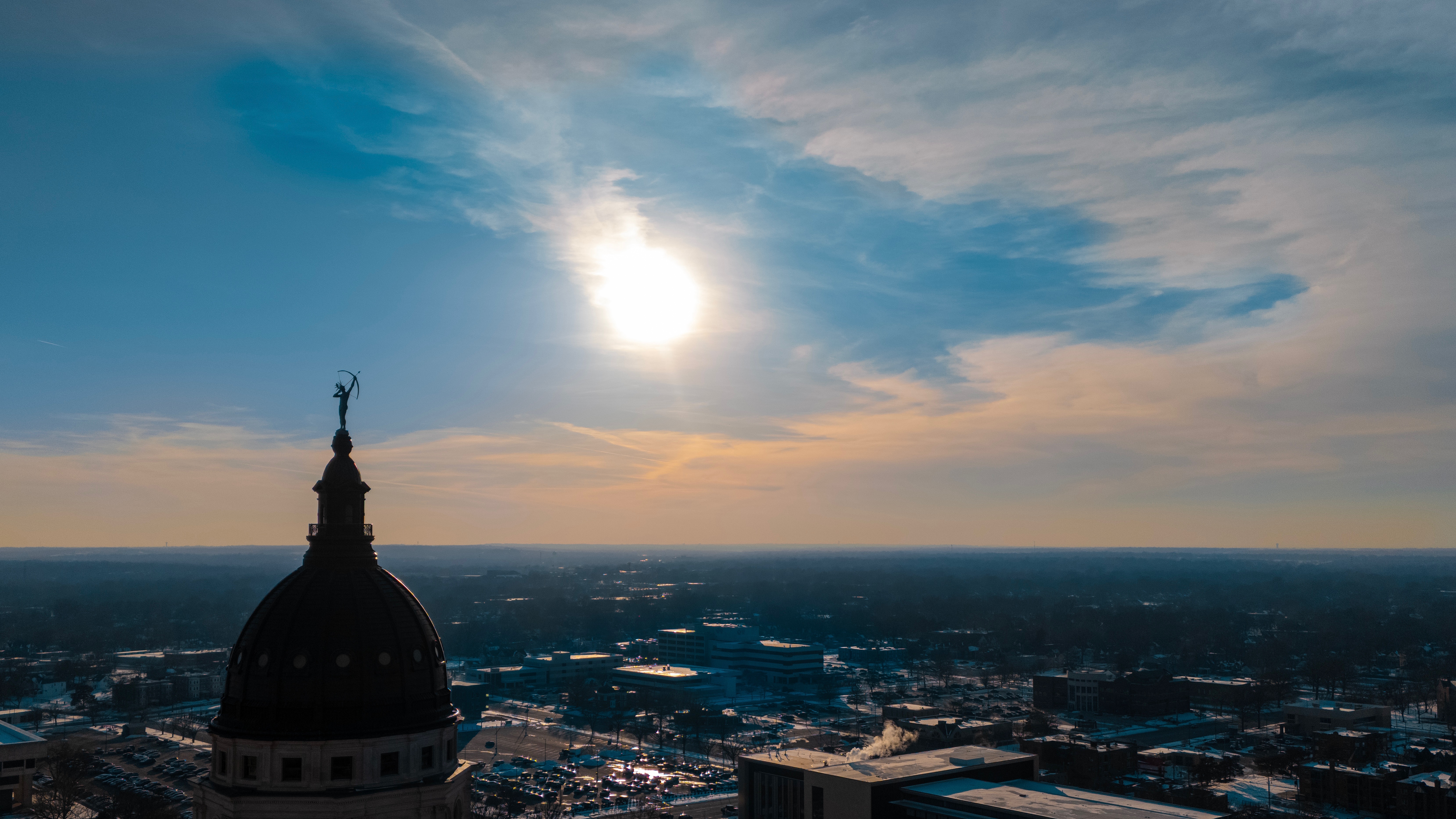 Kansas State Capitol dome at sunrise, aerial view