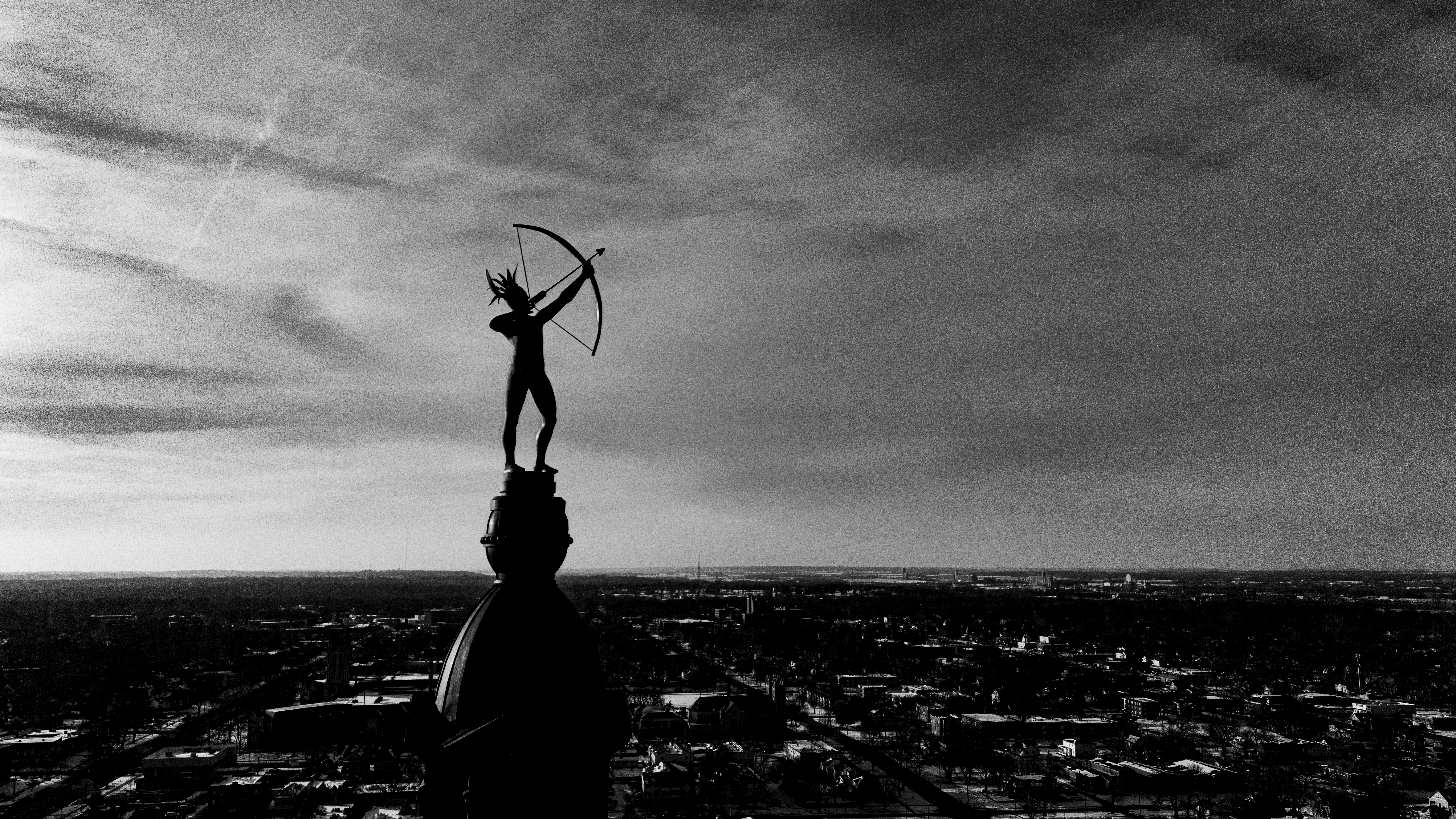 Ad Astra statue atop the Kansas State Capitol, black and white aerial